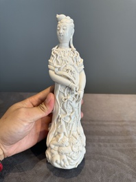 A pair of Chinese white-glazed figures and two Dehua blanc de Chine figures, 18th C. and Republic