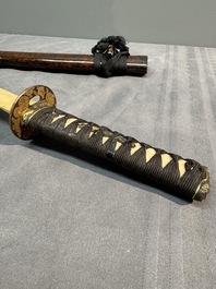 A collection of fine Japanese sword handles, guards, sheaths, a sword and a lacquered stand, Edo, 18/19th C.