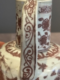 A Chinese copper-red and white 'flower scroll' ewer, Ming or later