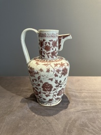 A Chinese copper-red and white 'flower scroll' ewer, Ming or later