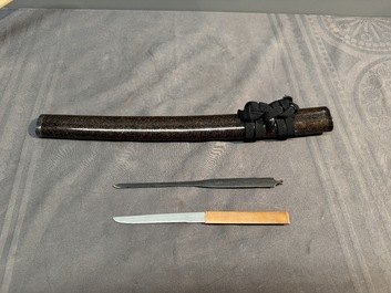 A collection of fine Japanese sword handles, guards, sheaths, a sword and a lacquered stand, Edo, 18/19th C.