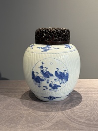 A Chinese blue and white 'playing boys' vase and wooden cover, Kangxi
