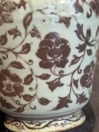 A Chinese copper-red and white 'flower scroll' ewer, Ming or later