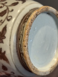 A Chinese copper-red and white 'flower scroll' ewer, Ming or later