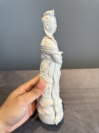 A pair of Chinese white-glazed figures and two Dehua blanc de Chine figures, 18th C. and Republic