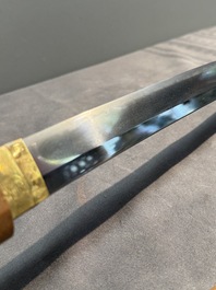 A collection of fine Japanese sword handles, guards, sheaths, a sword and a lacquered stand, Edo, 18/19th C.
