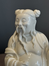A pair of Chinese white-glazed figures and two Dehua blanc de Chine figures, 18th C. and Republic