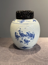 A Chinese blue and white 'playing boys' vase and wooden cover, Kangxi