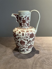A Chinese copper-red and white 'flower scroll' ewer, Ming or later
