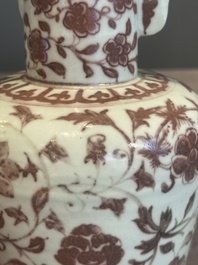 A Chinese copper-red and white 'flower scroll' ewer, Ming or later