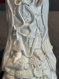A pair of Chinese white-glazed figures and two Dehua blanc de Chine figures, 18th C. and Republic