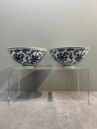 A pair of Chinese blue and white 'lotus scroll' bowls, Yongzheng mark and possibly of the period