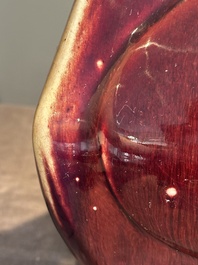 A Chinese flamb&eacute;-glazed 'hu' vase, 19th C.