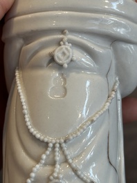 A pair of Chinese white-glazed figures and two Dehua blanc de Chine figures, 18th C. and Republic