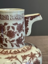 A Chinese copper-red and white 'flower scroll' ewer, Ming or later
