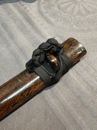 A collection of fine Japanese sword handles, guards, sheaths, a sword and a lacquered stand, Edo, 18/19th C.