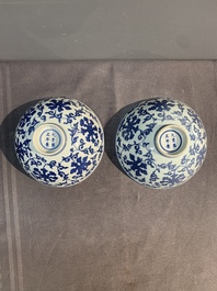 A pair of Chinese blue and white 'lotus scroll' bowls, Yongzheng mark and possibly of the period