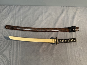A collection of fine Japanese sword handles, guards, sheaths, a sword and a lacquered stand, Edo, 18/19th C.