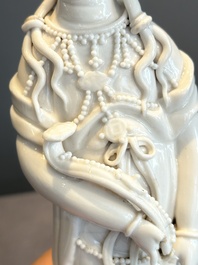A pair of Chinese white-glazed figures and two Dehua blanc de Chine figures, 18th C. and Republic