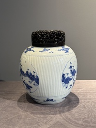 A Chinese blue and white 'playing boys' vase and wooden cover, Kangxi