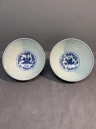 A pair of Chinese blue and white 'lotus scroll' bowls, Yongzheng mark and possibly of the period