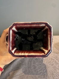A Chinese flamb&eacute;-glazed 'hu' vase, 19th C.