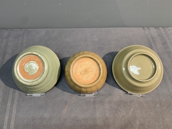 Two Chinese Longquan celadon incense burners and three saucers, Yuan/Ming