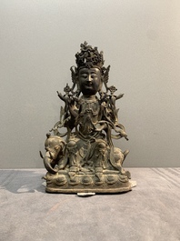A Chinese bronze Bodhisattva seated on an elephant, Ming
