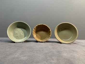 Two Chinese Longquan celadon incense burners and three saucers, Yuan/Ming