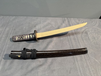 A collection of fine Japanese sword handles, guards, sheaths, a sword and a lacquered stand, Edo, 18/19th C.