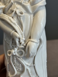 A pair of Chinese white-glazed figures and two Dehua blanc de Chine figures, 18th C. and Republic