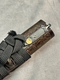 A collection of fine Japanese sword handles, guards, sheaths, a sword and a lacquered stand, Edo, 18/19th C.