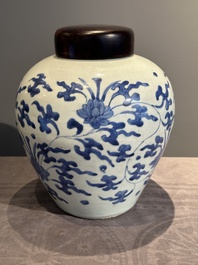 A Chinese blue and white 'lotus scroll' vase with wooden cover, Kangxi