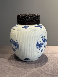 A Chinese blue and white 'playing boys' vase and wooden cover, Kangxi