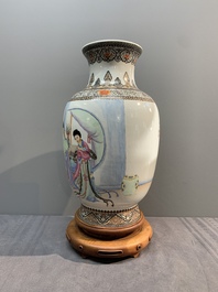 A Chinese famille rose vase with ladies on wooden stand, Qianlong mark, Republic