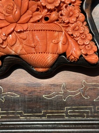 A Chinese silver-inlaid hardwood table screen with a red coral carving of a flower basket, 19/20th C.