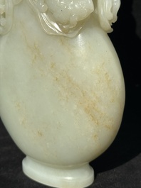 A fine Chinese white jade 'Buddhist lions' vase and cover, Qing