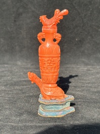 A Chinese carved red coral 'mythical animals' snuff bottle on stand, 19/20th C.