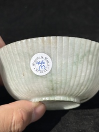 A Chinese jade 'chrysanthemum' bowl, an archer's ring and a belt hook, Ming/Qing