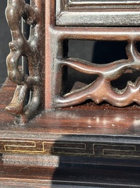 A Chinese silver-inlaid hardwood table screen with a red coral carving of a flower basket, 19/20th C.