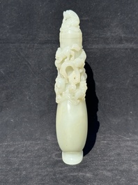 A fine Chinese white jade 'Buddhist lions' vase and cover, Qing