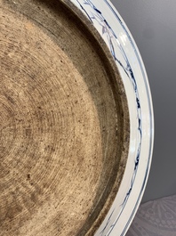 A massive Chinese blue and white 'landscape' dish, 19th C.