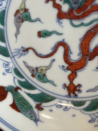 A Chinese doucai 'dragon and carps' plate, Chenghua mark, Yongzheng