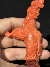 Two Chinese red coral figures of Shoulao on wooden stand, 19/20th C.