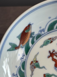 A Chinese doucai 'dragon and carps' plate, Chenghua mark, Yongzheng