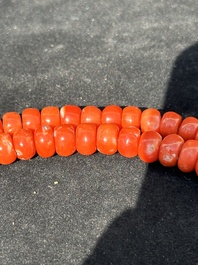 A Chinese necklace with red coral- and turquoise beads, 19th C.