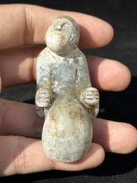 A varied collection of six Chinese jade carvings, including a snuff bottle, 19/20th C.
