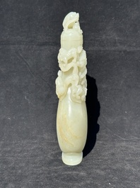A fine Chinese white jade 'Buddhist lions' vase and cover, Qing