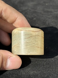 Five Chinese jade and agate archer's rings, Qing