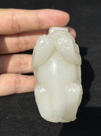 A Chinese white jade carving of a mythic animal, 19/20th C.